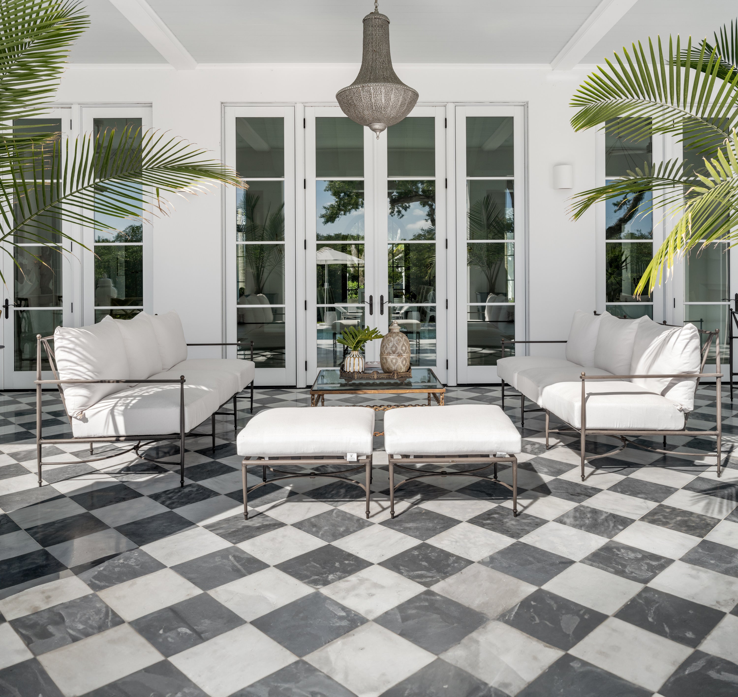 "Johns Island" Interior Design - Outdoor patio with white furniture on a black and white checkered floor